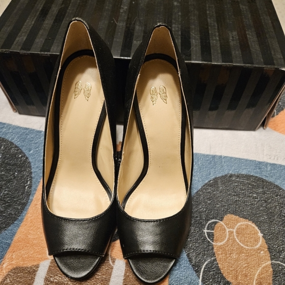 Black platform peeptoe heels
